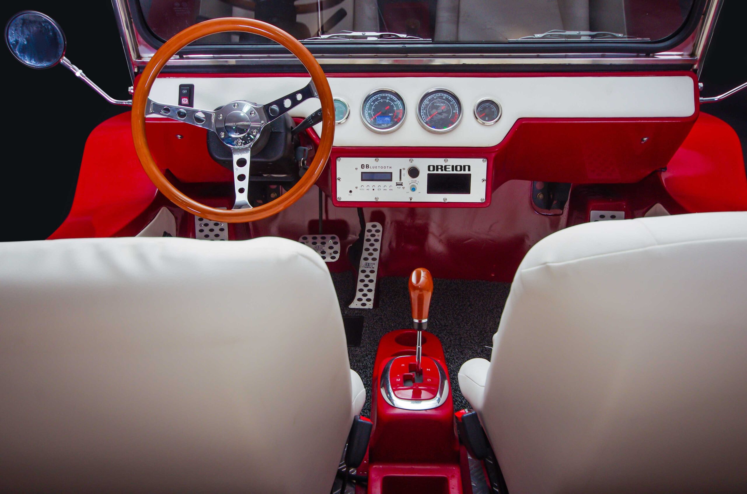 The cherry-red interior of a Buggy.