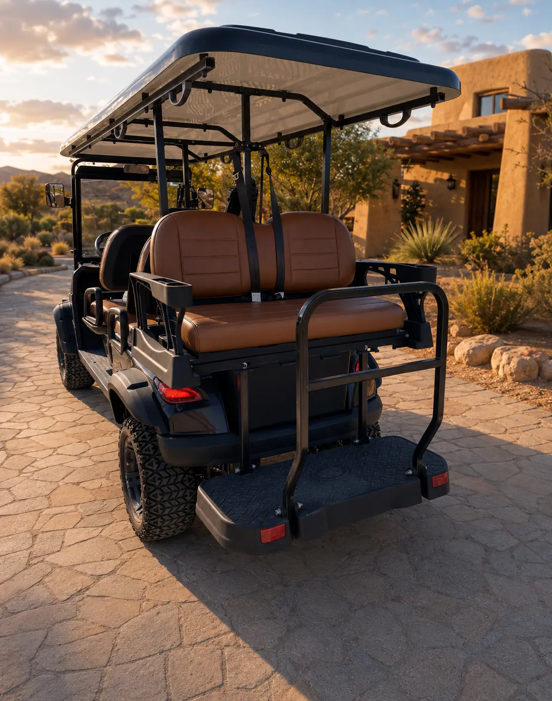 Rear seating, armrests, grab bar and footrest on an Oreion 4–6 passenger golf cart