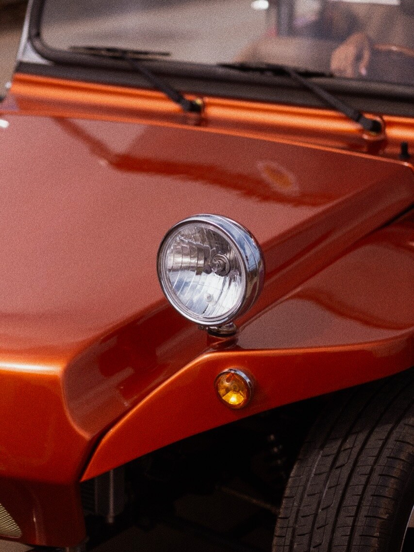Orange Oreion Buggy polished headlamp and body detail